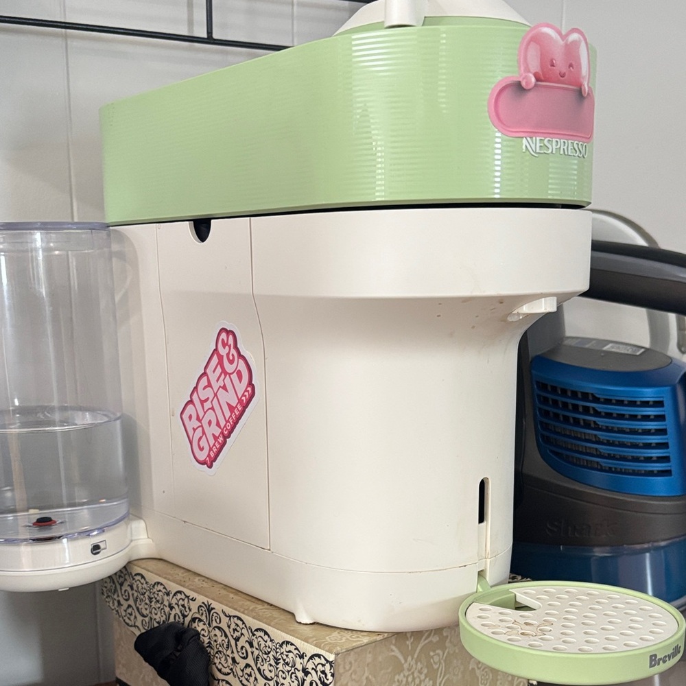 Nespresso Mint Green and White Coffee Maker